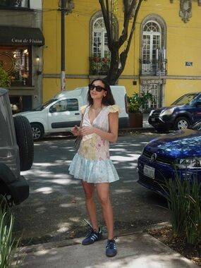 LoveShackFancy pastel floral mini dress in blue, yellow, cream, pink